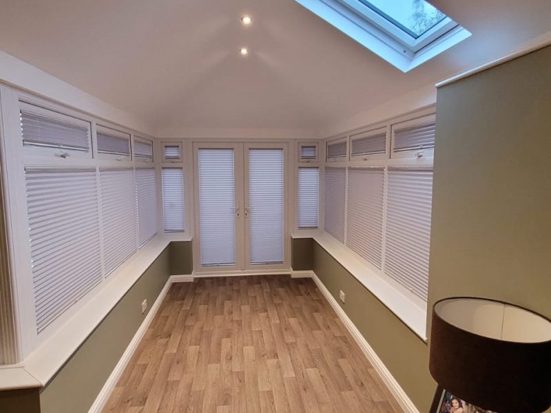Dove Grey Pleated Intu Blinds Transforming a Sunroom