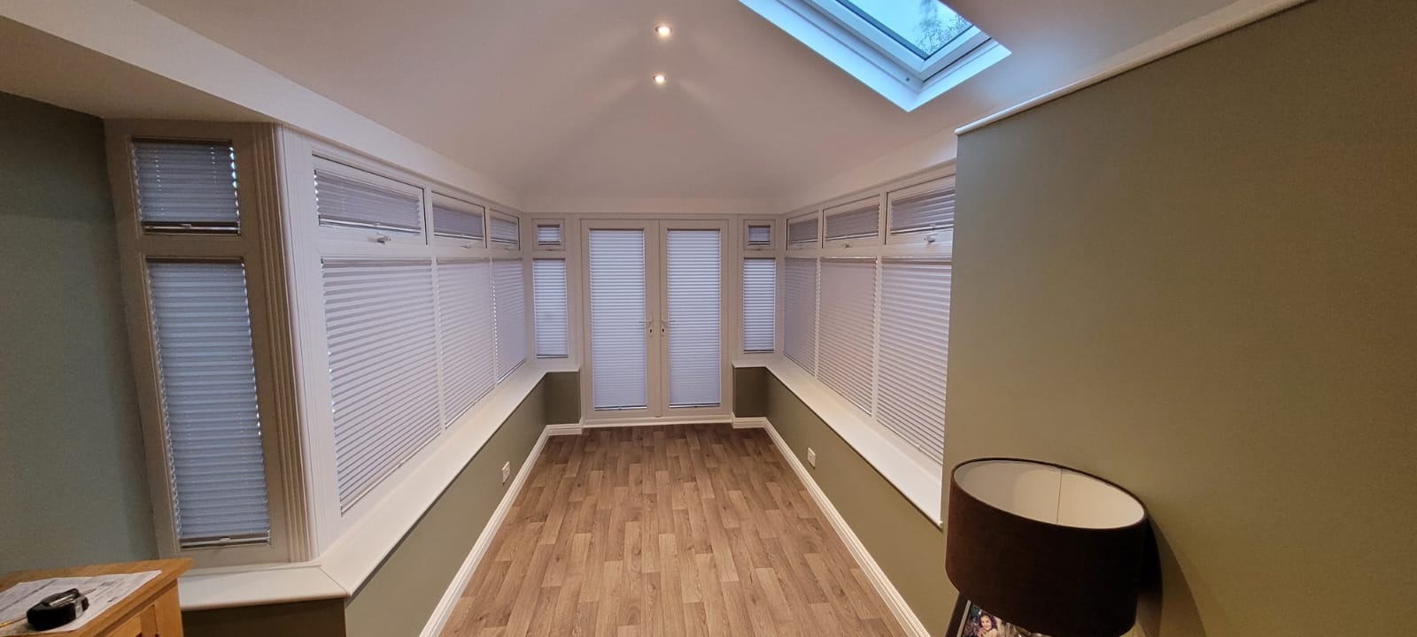 Dove Grey Pleated Intu Blinds Transforming a Sunroom