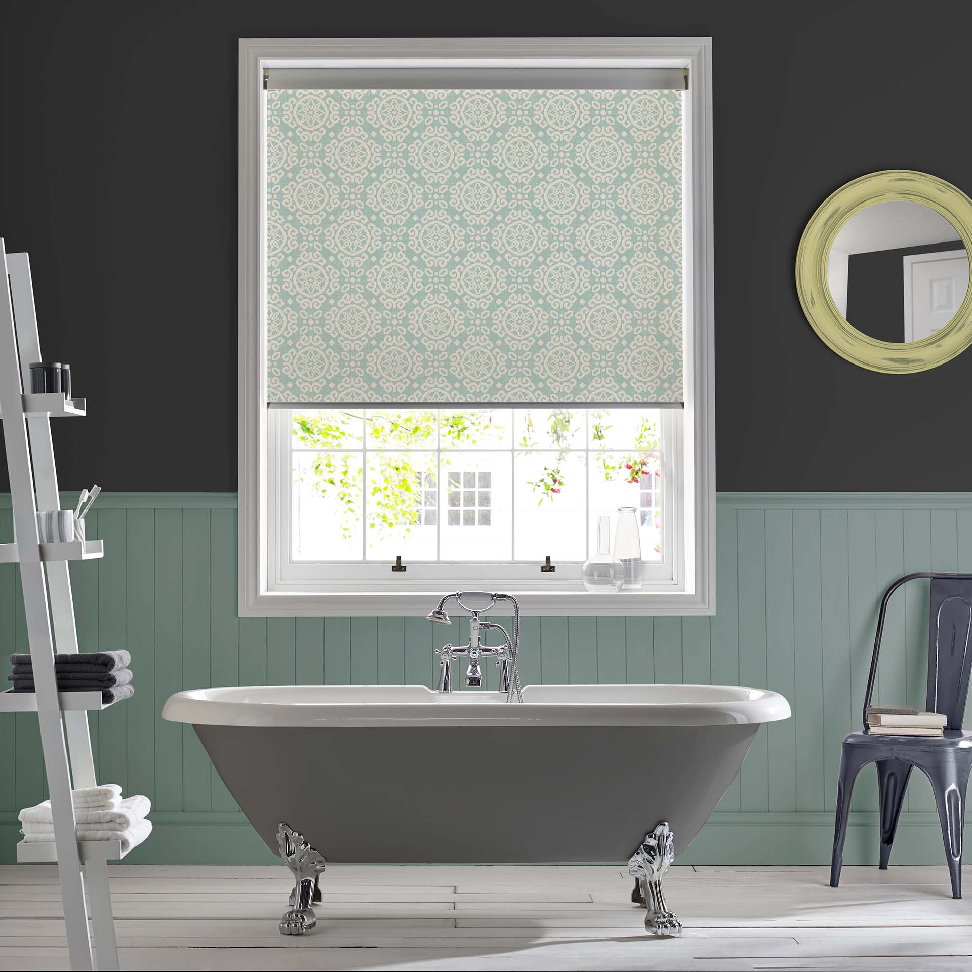 The Best Bathroom Blinds - this image shows elegant roller blinds in a bathroom