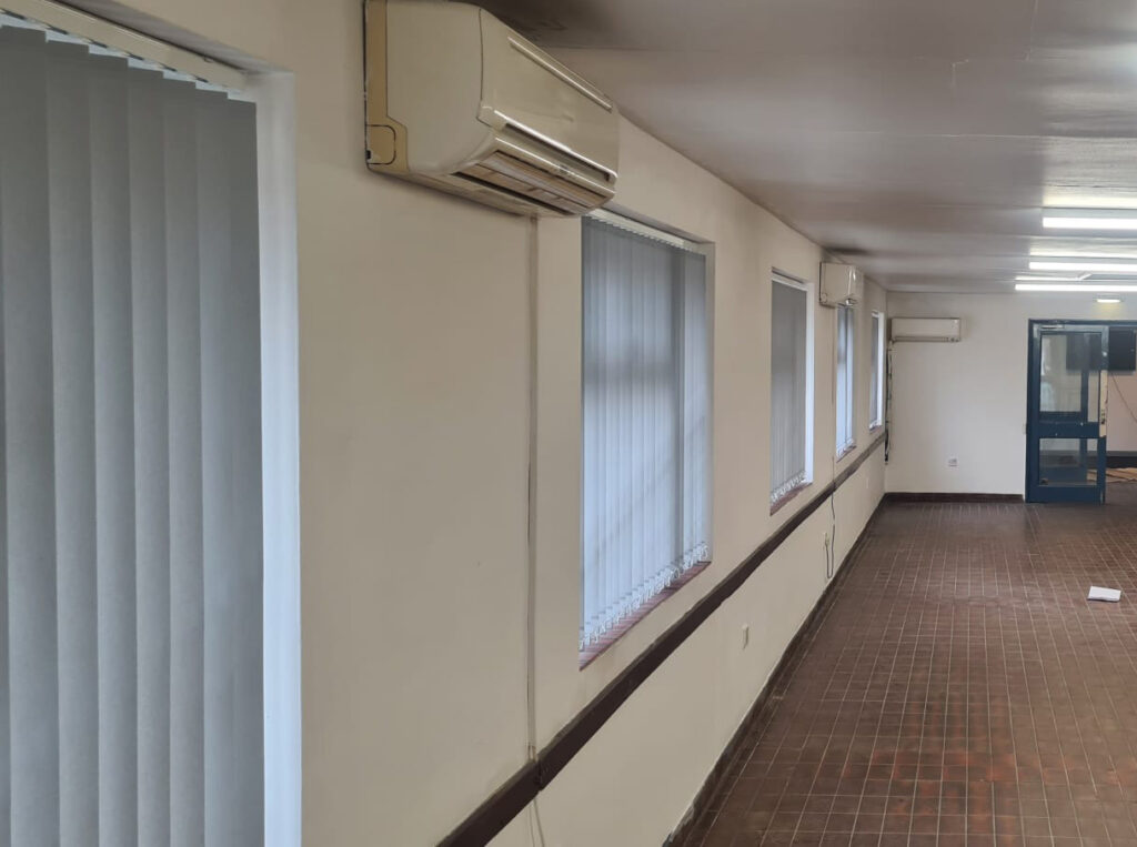 Vertical Blinds by Gillians Blinds - this image shows the soft grey vertical blinds we installed at Jacks Hill Cafe in Towcester