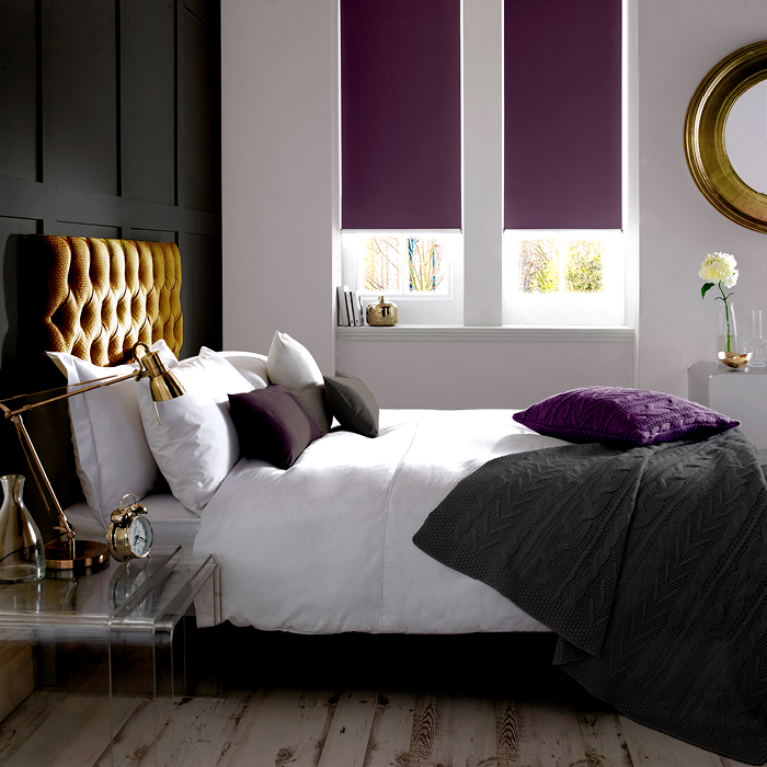 Dark purple blackout roller blinds creating a bold contemporary bedroom design