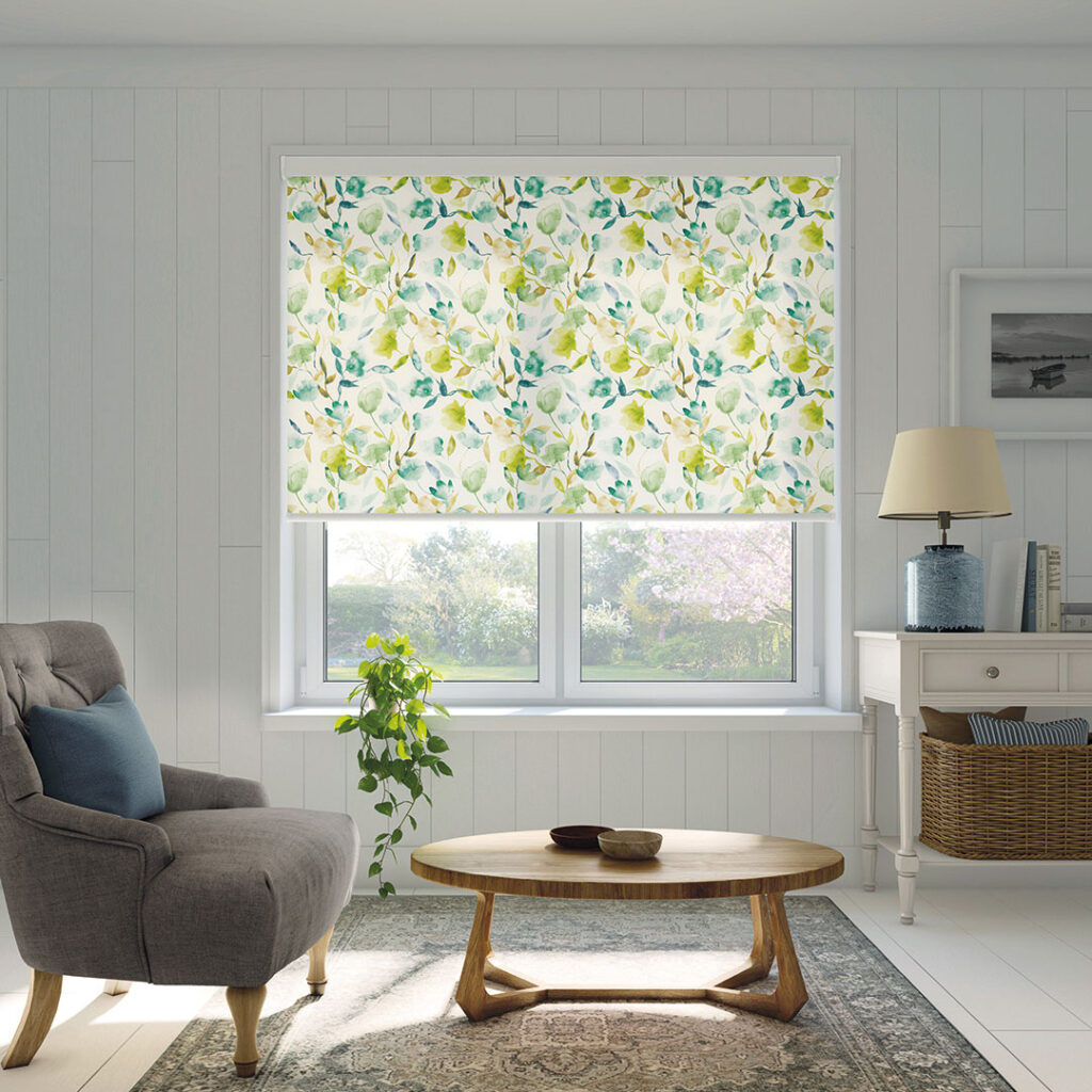 loral roller blind providing light control in a bright garden room