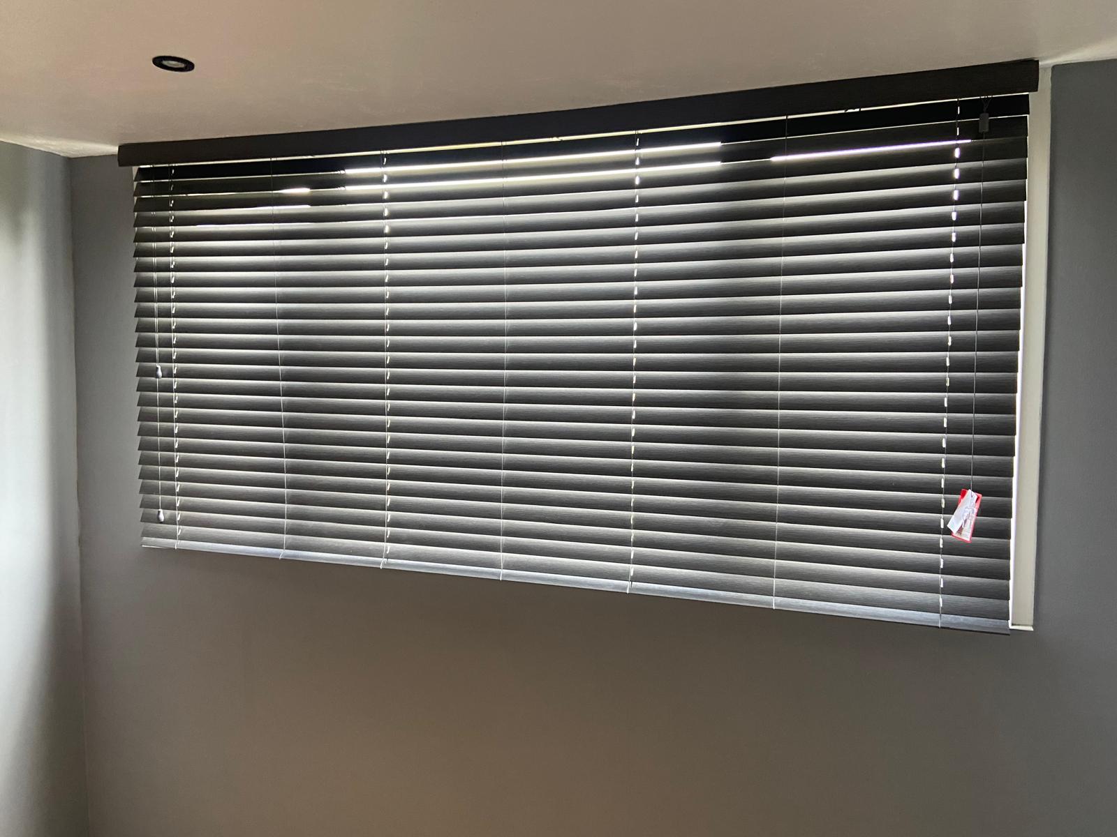 Black Venetian Blinds Installed in Kingsthorpe: A Bold Choice for a Wide Window
