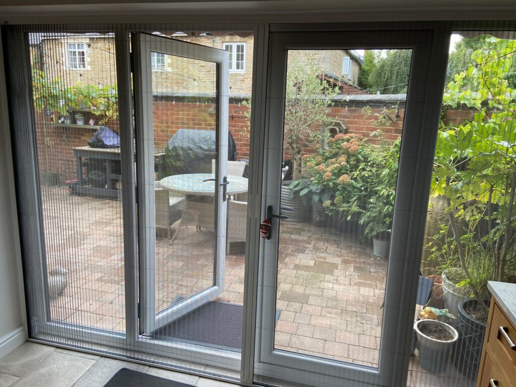 Made-to-measure fly screen across a wide garden doorway in Geddington